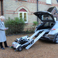 Load image into Gallery viewer, ComfyGO Quingo Flyte mobility scooter with MK2 self-loading ramp, compact design for easy outdoor transportation.