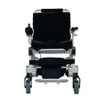 Load image into Gallery viewer, EZ Lite Cruiser Deluxe Regular DX8 electric wheelchair unfolded, front view showing sturdy frame and controls