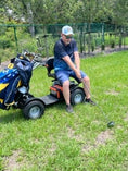 Load image into Gallery viewer, Discover Your Mobility Cheeta Ninja all-terrain bariatric scooter shown from the side with sturdy design and large tires for outdoor use.