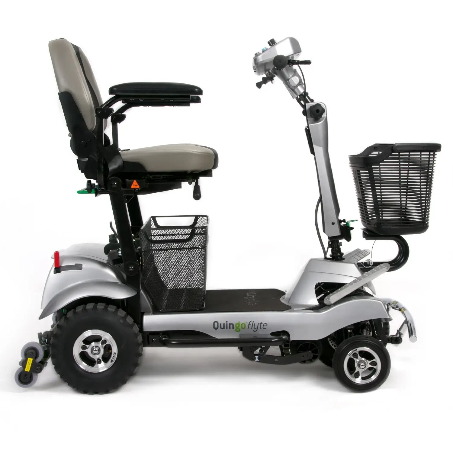 ComfyGO Quingo Flyte mobility scooter with MK2 self-loading ramp, showcasing its compact design and loading features.