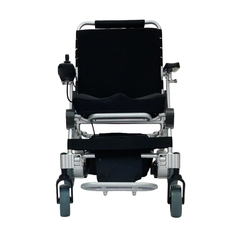EZ Lite Cruiser Deluxe Regular DX8 electric wheelchair unfolded, front view showing sturdy frame and controls